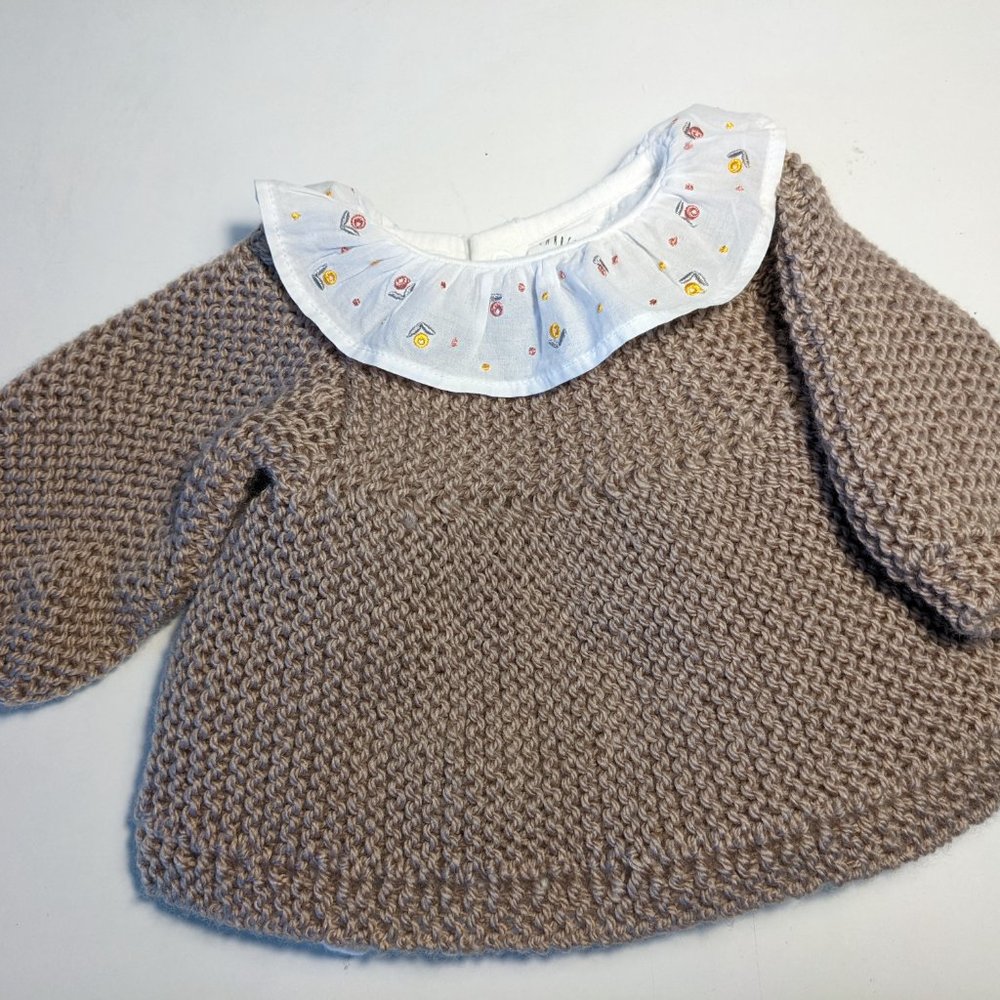 Hand knitted taupe baby dress